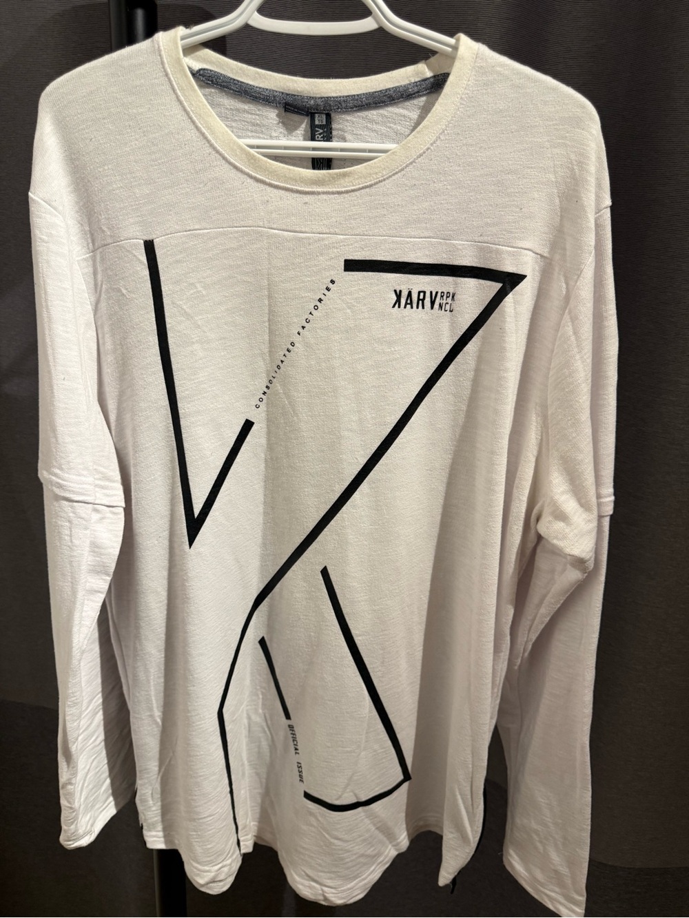 Men's White Long-Sleeve Graphic Tee with Black Geometric Design